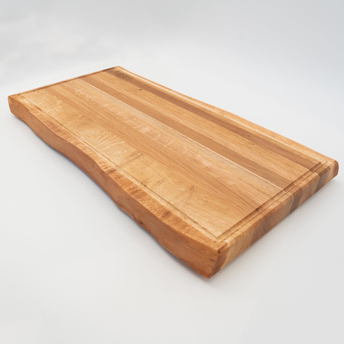 BABOSSA | Eichen Schneidebrett XL | Naturkante | Saftrille | 70x40x6 cm - grillstir.comBABOSSA | Eichen Schneidebrett XL | Naturkante | Saftrille | 70x40x6 cmHolzbrettBABOSSAgrillstir.com