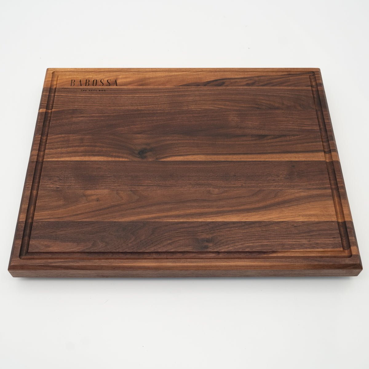 BABOSSA | Nussbaum Schneidebrett L | Naturkante | Saftrille | 44,5x35x4,5 cm - grillstir.comBABOSSA | Nussbaum Schneidebrett L | Naturkante | Saftrille | 44,5x35x4,5 cmHolzbrettBABOSSAgrillstir.com