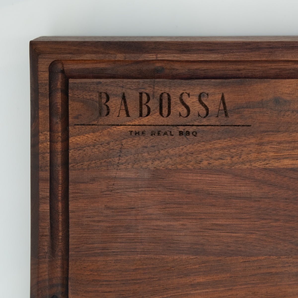 BABOSSA | Nussbaum Schneidebrett XL | Naturkante | Saftrille | 70x40x6 cm - grillstir.comBABOSSA | Nussbaum Schneidebrett XL | Naturkante | Saftrille | 70x40x6 cmHolzbrettBABOSSAgrillstir.com