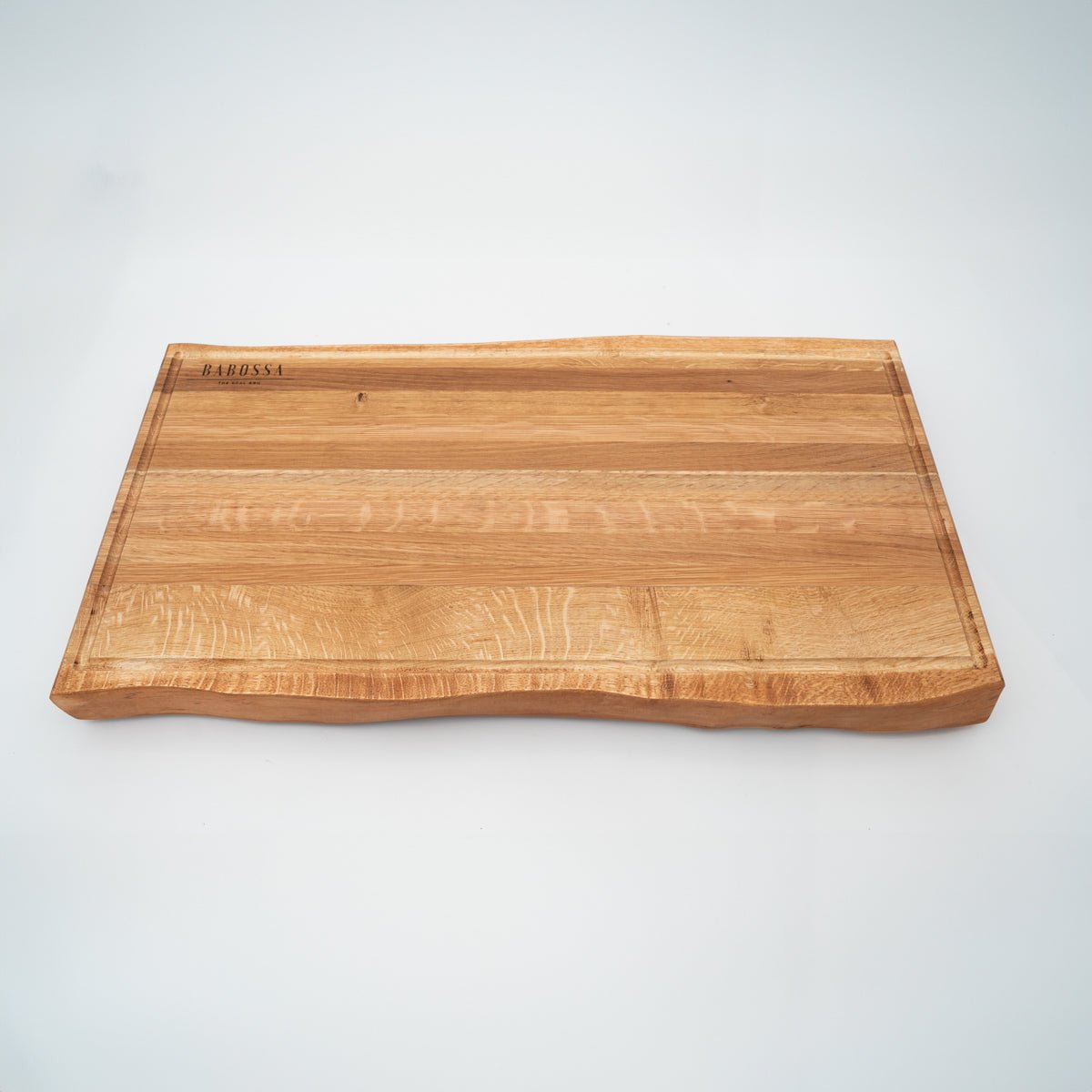 BABOSSA | Eichen Schneidebrett XL | Naturkante | Saftrille | 70x40x6 cm - grillstir.comBABOSSA | Eichen Schneidebrett XL | Naturkante | Saftrille | 70x40x6 cmHolzbrettBABOSSAgrillstir.com