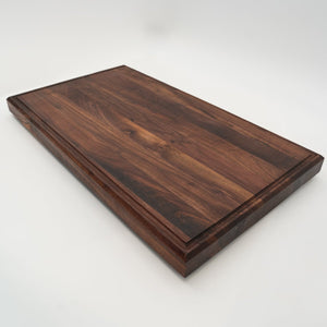 BABOSSA | Nussbaum Schneidebrett XL | Naturkante | Saftrille | 70x40x6 cm - grillstir.comBABOSSA | Nussbaum Schneidebrett XL | Naturkante | Saftrille | 70x40x6 cmHolzbrettBABOSSAgrillstir.com